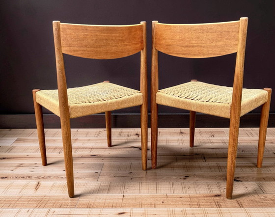 Image 1 of Een paar Deense eetkamerstoelen van Poul Volther voor Frem Rojle. Midden 20e eeuw.