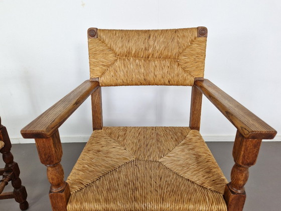 Image 1 of Vintage Franse Armleuningstoelen | Eiken en Riet