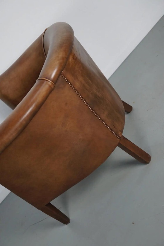 Image 1 of Vintage Nederlandse clubfauteuil van cognackleurig leer