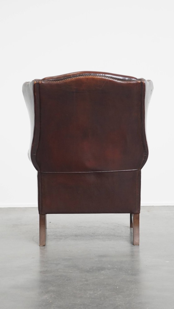 Image 1 of Donkere Engelse stijl schapenleren oorfauteuil