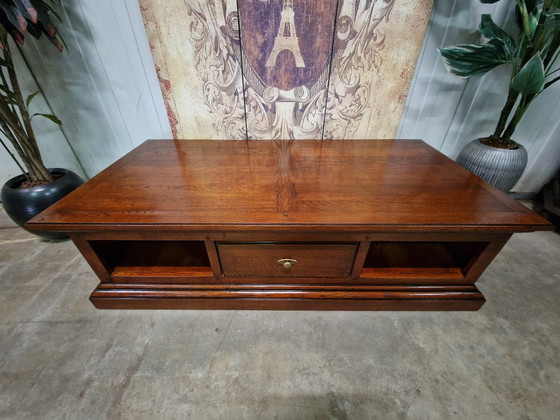 Image 1 of Klassischer Couchtisch aus dunkler Kirsche mit den Maßen 140x70cm und 40cm Höhe.