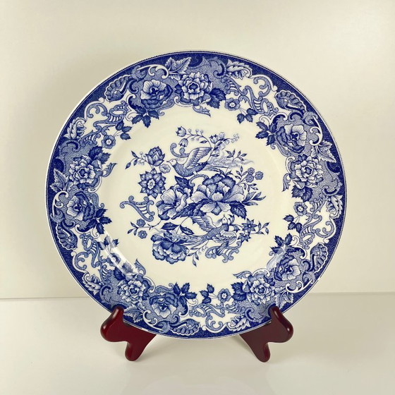Image 1 of Set of 8 blue earthenware dinner plates with floral and bird decoration, early 20th century