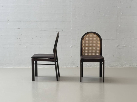 Image 1 of Set van 6 stoelen met rieten en lederen zittingen van Dietiker, jaren 80.