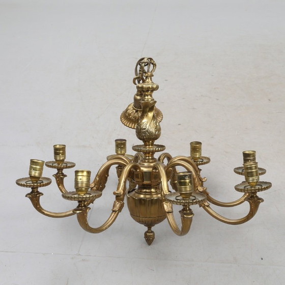 Image 1 of Antique brass chandelier dating from 1920–1930, with eight fittings, dimensions 21 cm wide, 55 cm high and 75 cm deep, in good 