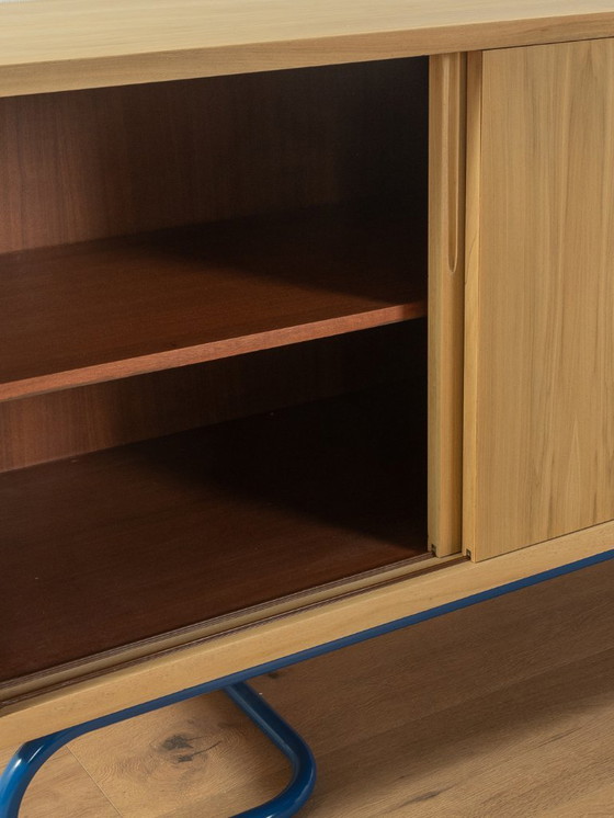 Image 1 of Dressoir uit 1950 met blauwe bauhaus poten