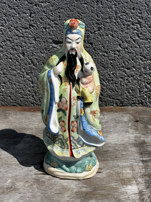 Pink Family Enameled Biscuit Figurine - Fu-Xing carrying a Child H 27 cm