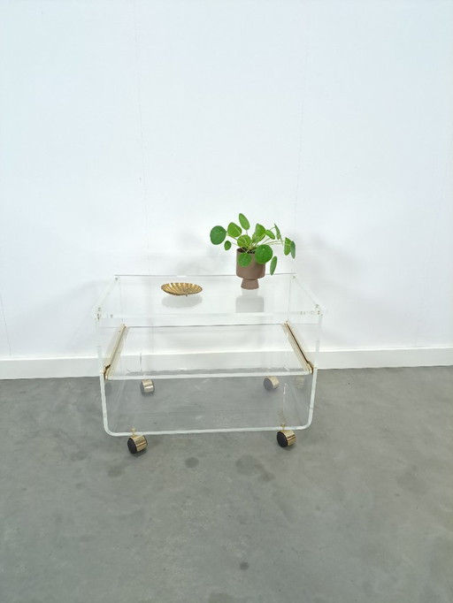 Space age plexiglass trolley with brass
