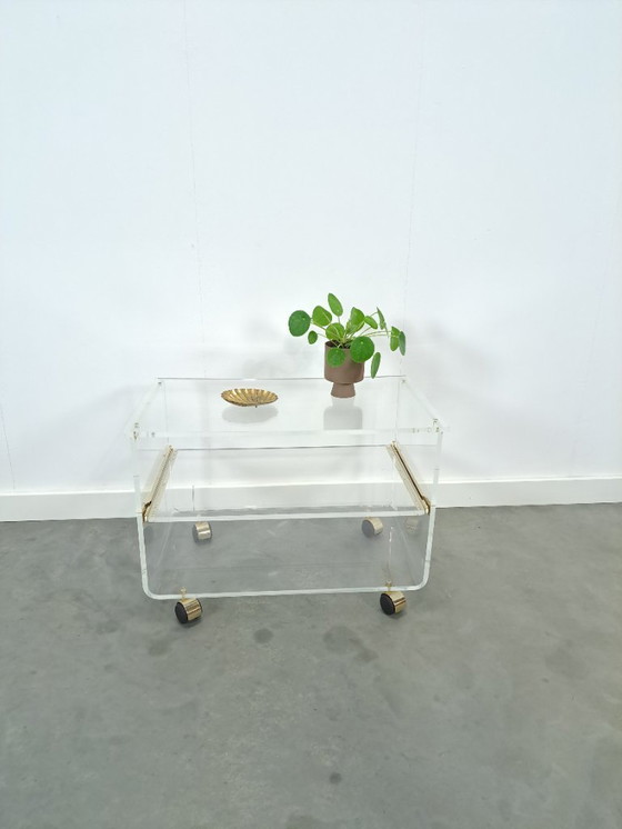 Image 1 of Space age plexiglas trolley met messing