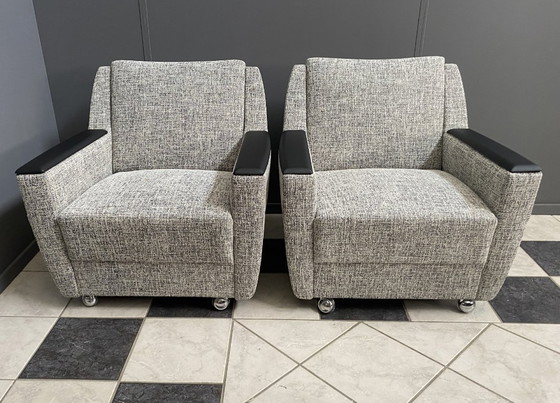Image 1 of set of 2 grey relax chairs on castors 1970s
