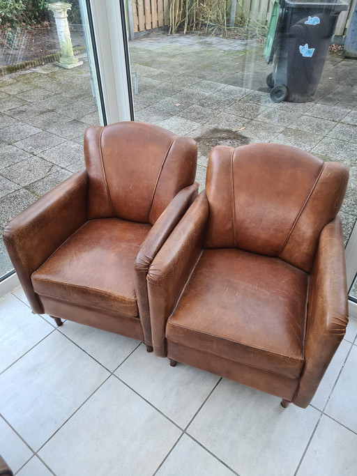 Poltrone club Art Deco vintage, in pregiata pelle di pecora