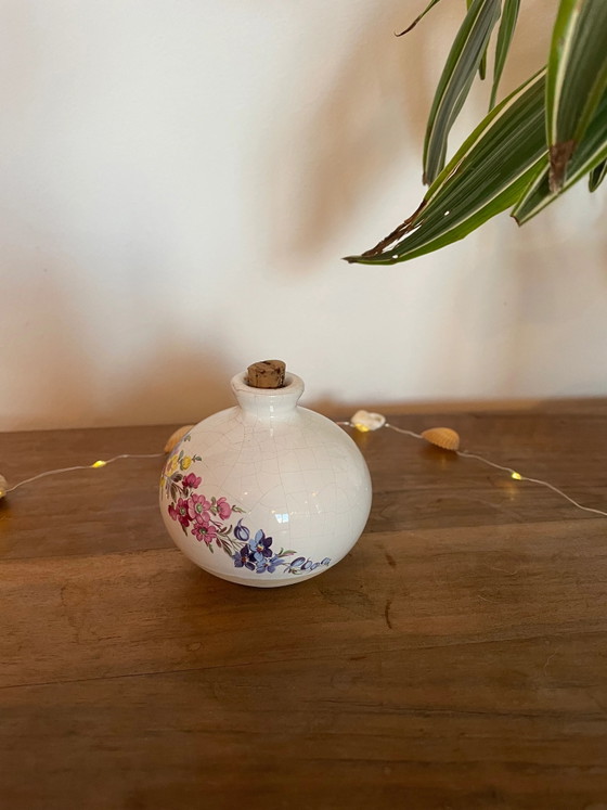 Maceta decorativa con flores silvestres (photo 2 of 2)