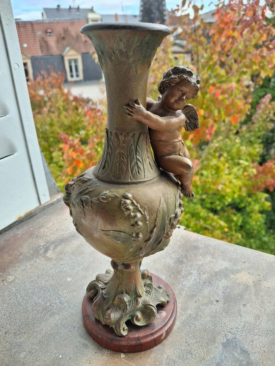 Image 1 of Pair of Art Nouveau spelter vases, circa 1900, with cherubs and a double patina