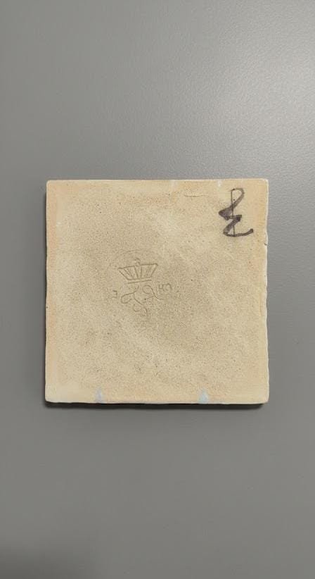 Image 1 of Antique Dutch Delft Tile with Seamstress Motif
