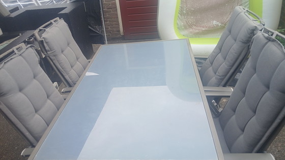 Image 1 of Garden set table + 4 chairs +4 cushions. Neatly maintained