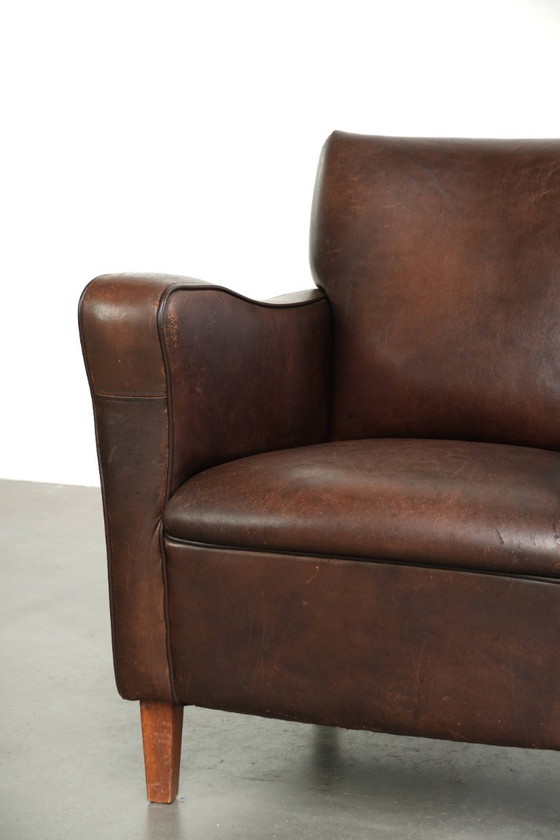 Fauteuil Subtil Foncé Vintage En Cuir De Mouton Avec Coussin Fixe Et Design Intemporel – Leather, Klassiek (photo 9 of 12)