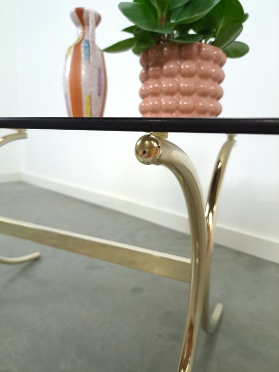 Image 1 of Tavolino in vetro fumé con gambe dorate dalla Svezia