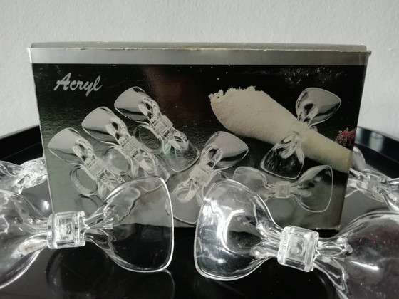 Image 1 of Anelli per tovaglioli in acrilico e papillon