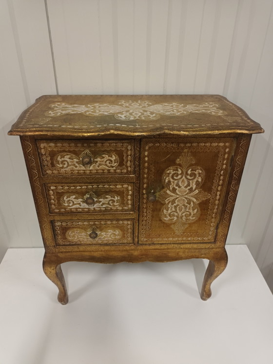 Image 1 of Gold-colored Florentine chest of drawers