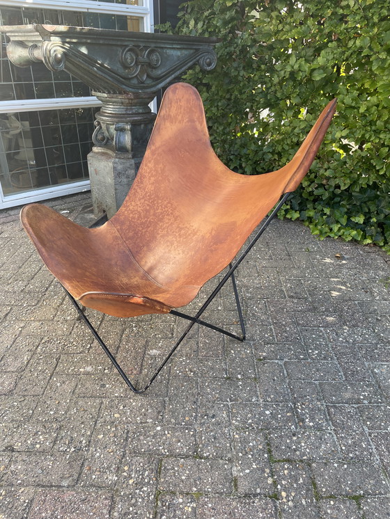 Image 1 of Jaren 60 vlinderstoel met tuiglederen zitting