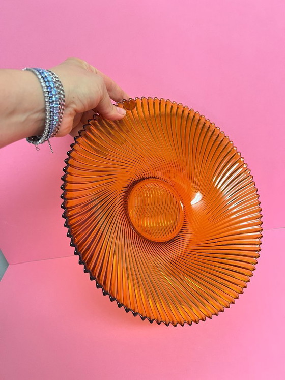 Image 1 of Vintage 70s swirl amber glass amber sunburst fruit bowl sawtooth edge orange