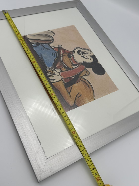 Image 1 of Estampe Disney Mickey et Pluto « L’achat de Pluto en 1948 » – encadrée par un professionnel