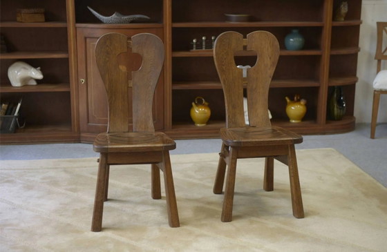 Brutalist pair of chairs by De Puydt in oak, 1960s. – Dining chairs (photo 4 of 9)