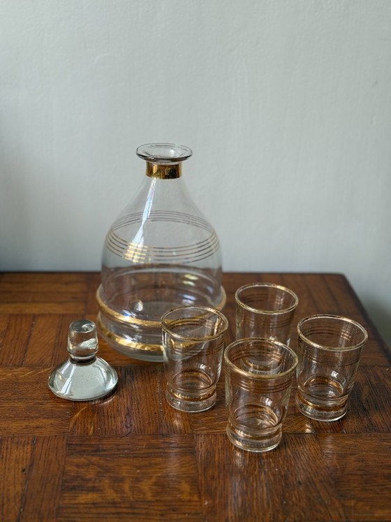 Image 1 of Art Deco style decanter and 8 gold-rimmed liqueur glasses