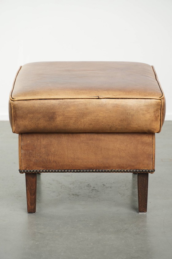 Characterful Cowhide Leather Stool With a Beautiful Patina Finished With Decorative Nails (photo 4 of 10)