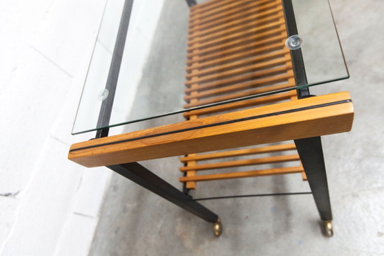 Image 1 of Serveerwagen uit de jaren 60, hifi-kast op wieltjes in teakhout, zwart metaal en glazen blad.