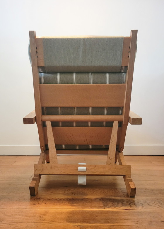 Image 1 of Fauteuil en Voetenbank van Hans J. Wegner voor AP Stolen