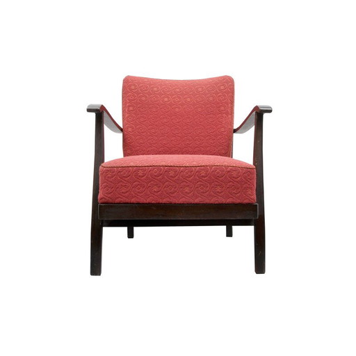 Poltrona vintage in rosso pallido