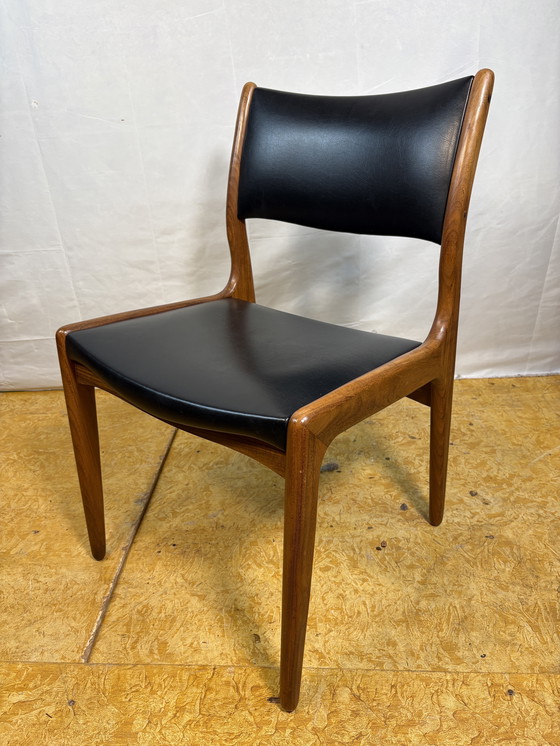 Image 1 of Mid-Century Retro Set of 8 Dining Chairs by Johannes Andersen for Uldum Møbelfabrik 1960  Elevate your dining space with this st