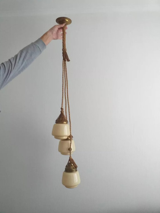 Image 1 of Lampadario Art Déco composto da 3 globi in vetro opalino color miele e passamaneria