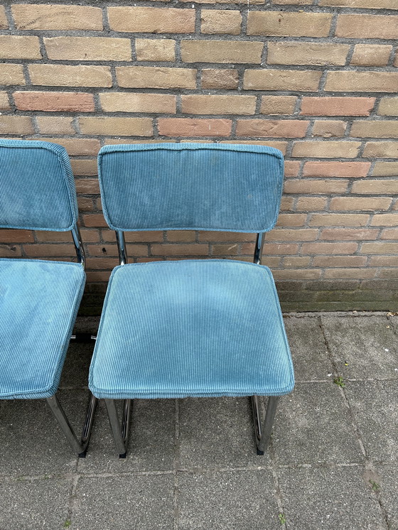 Image 1 of 4 Stühle mit geripptem Stoffbezug und verchromtem Rohrgestell