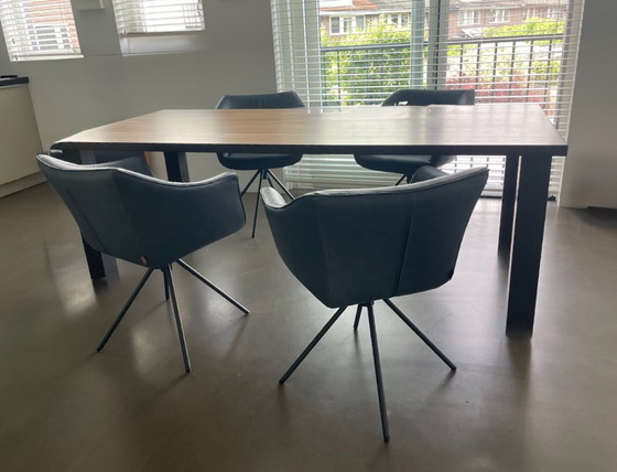 Image 1 of 4x Tulip Label van den Berg swivel leather dining chairs