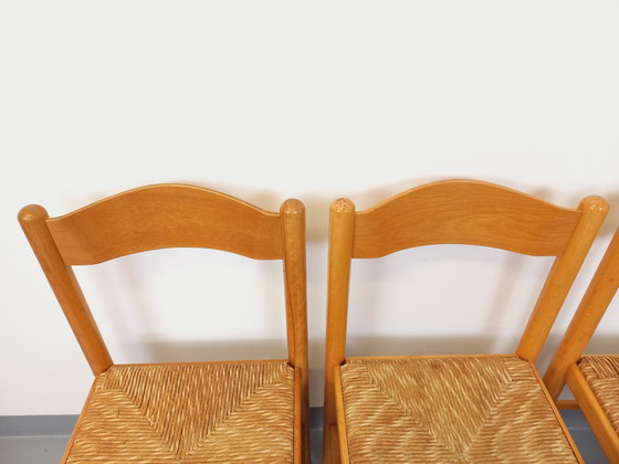 Image 1 of Suite van 4 Vintage Brutalistische stoelen in licht hout en stro uit de jaren 70 en 80