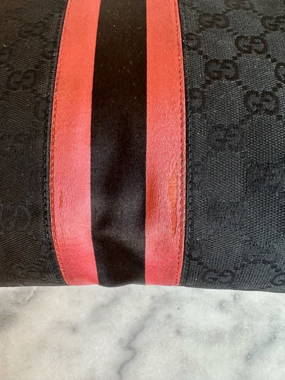 Image 1 of borsa con morsetto per cavalli