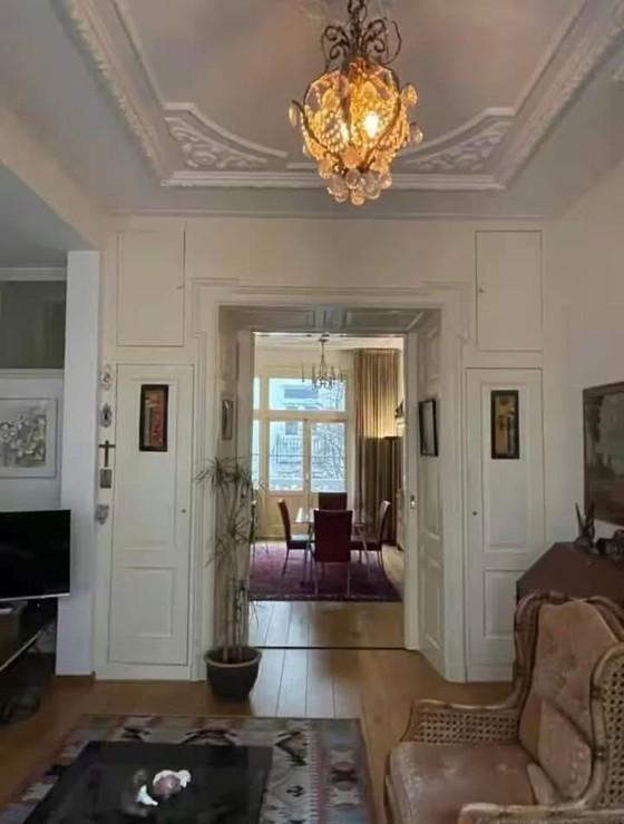 Image 1 of Lèche-bottes bronzées vintage