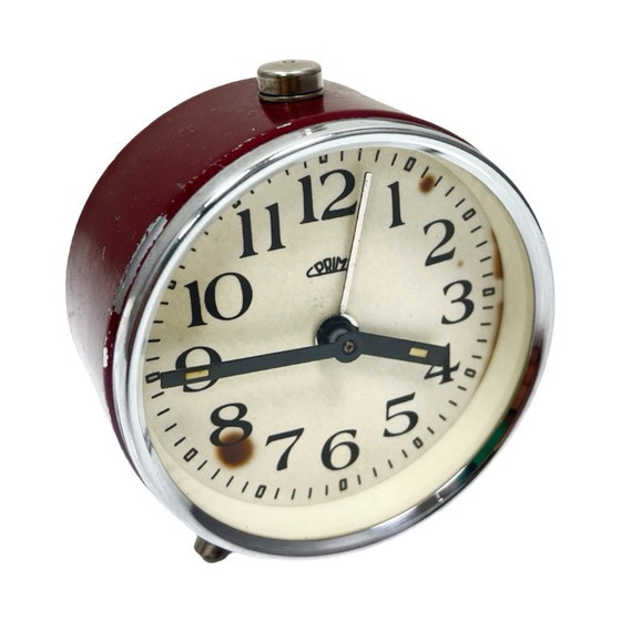 Image 1 of Burgundy PRIM Vintage mechanical alarm clock, FUNCTIONAL, Czechoslovakia, 1960s.