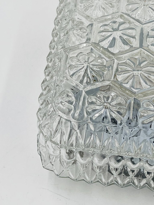 Glazen plafondlamp met verhoogd madeliefjesmotief