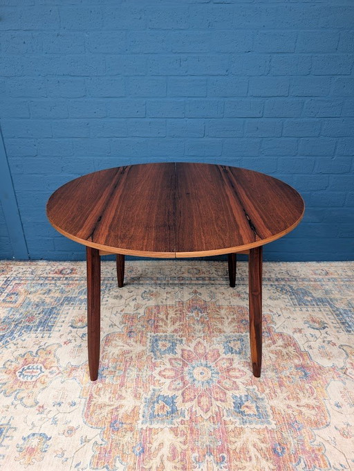 Table de salle à manger ronde en palissandre, extensible, années 1960