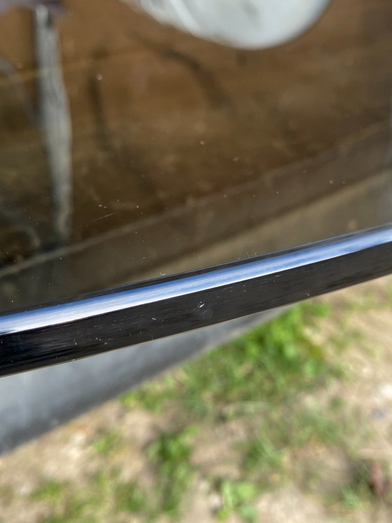 Image 1 of Round smoked glass and chrome table by Florence Knoll and Roche Bobois, 1970s