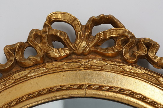 Image 1 of Oval shaped carved gilded Baroque mirror with beveled glass, Belgium  