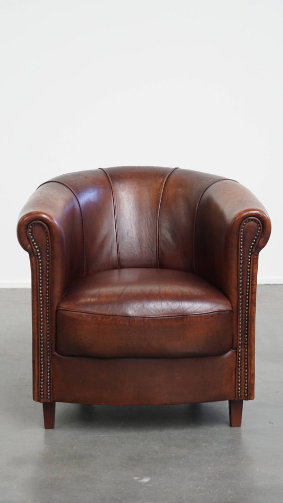 Image 1 of Sheep Leather Club Chair in a Dark Cognac Color