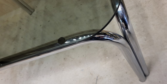 Image 1 of Tavolino da caffè in vetro fumé con struttura tubolare cromata