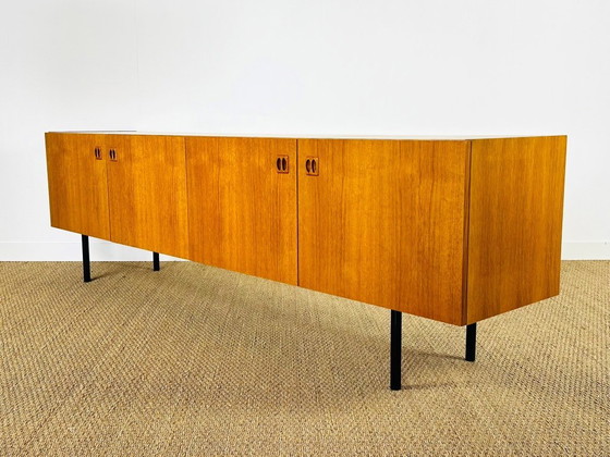Image 1 of Minimalist Scandinavian sideboard in teak with black metal legs, 1960