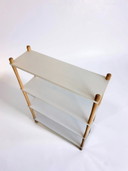 Vintage stick cabinet with white shelves