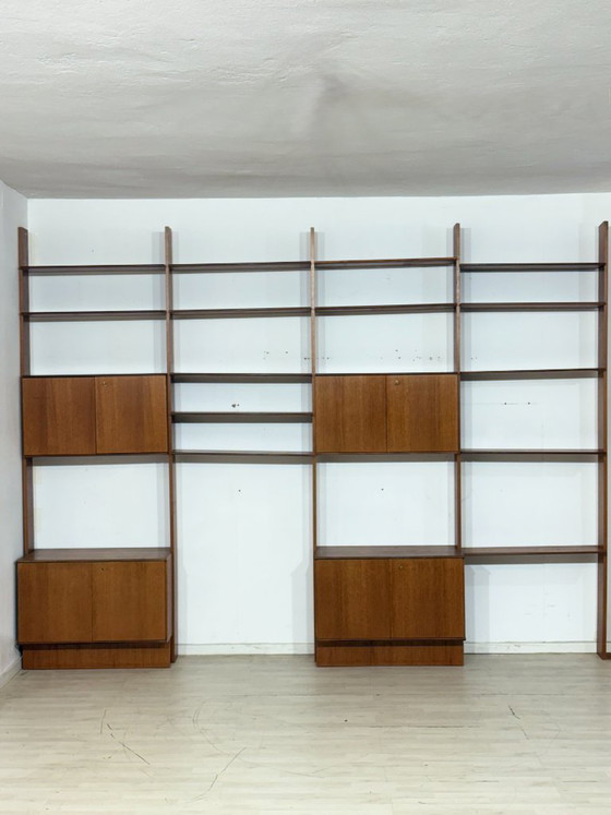 Modular mid-century wall shelf by interna-Peter Pedrides / Teak shelving system 1960s – Shelving unit, Wood (photo 2 of 27)