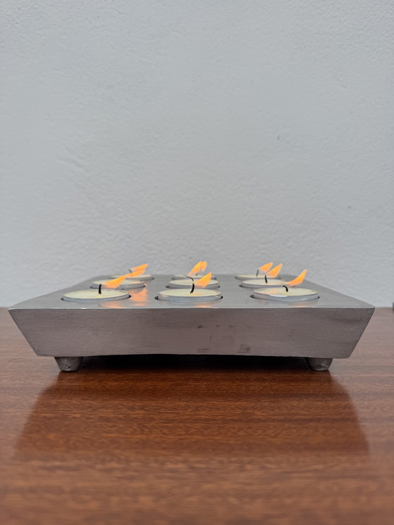 Image 1 of Brushed aluminum candle holder in a 1970s Scandinavian brutalist style