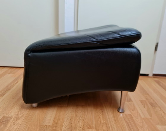 Image 1 of Puf reposapiés otomano Schillig de cuero negro